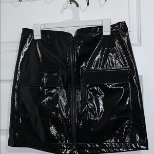 Black vinyl mini skirt
